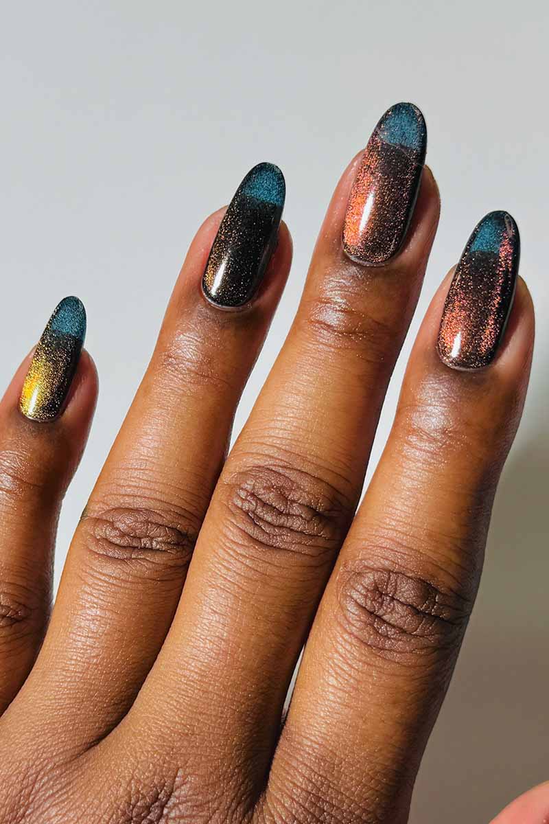 3D multichrome effect nails using Cirque Colors Castle in the Sky teal blue magnetic polish with bronze shimmer