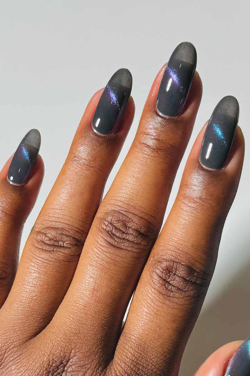 Cirque Colors Wishful Thinking smoke-gray magnetic nail polish with aqua-blue-violet multichrome effect on nails