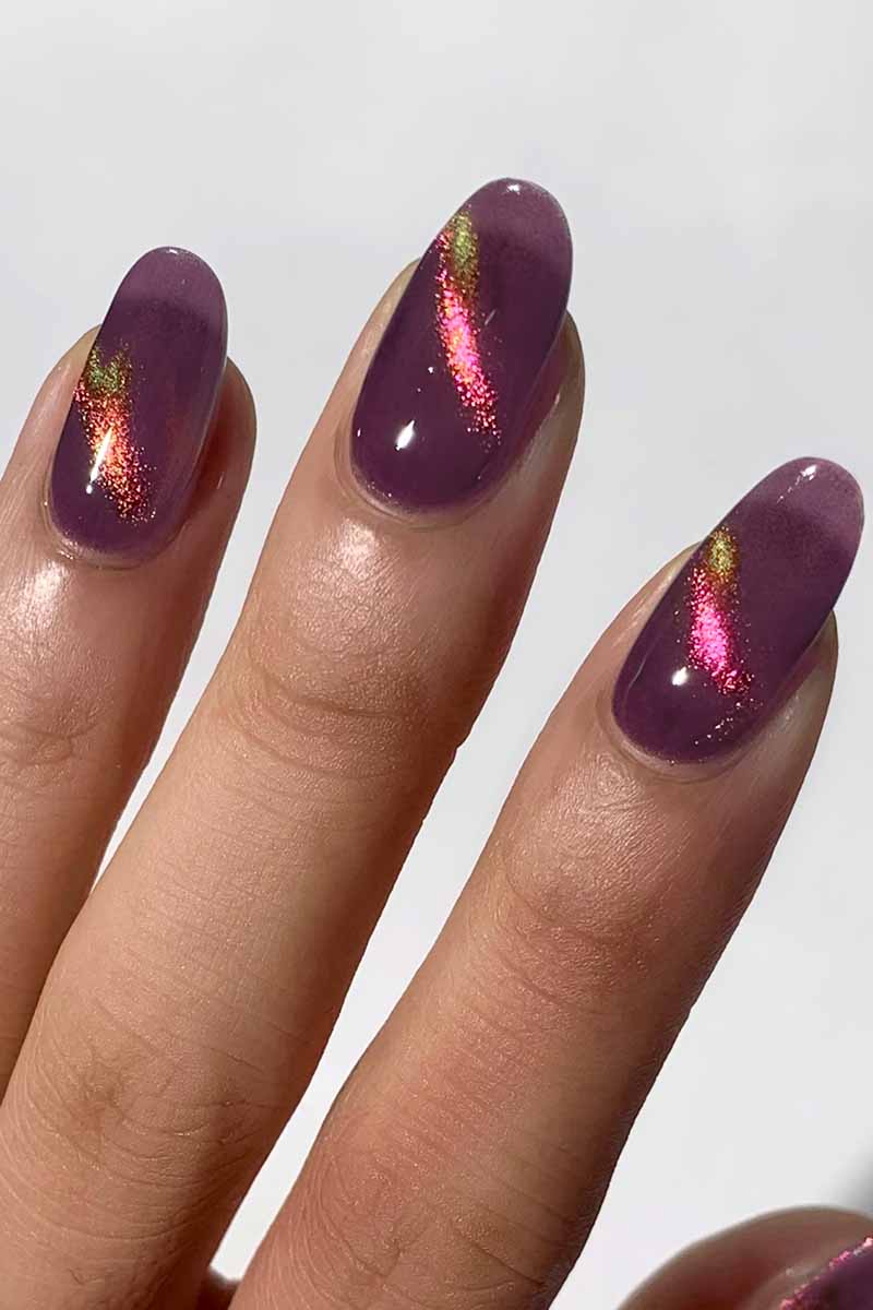 3D multichrome effect nails using Cirque Colors Fool’s Paradise purple magnetic polish with pink and gold shimmer